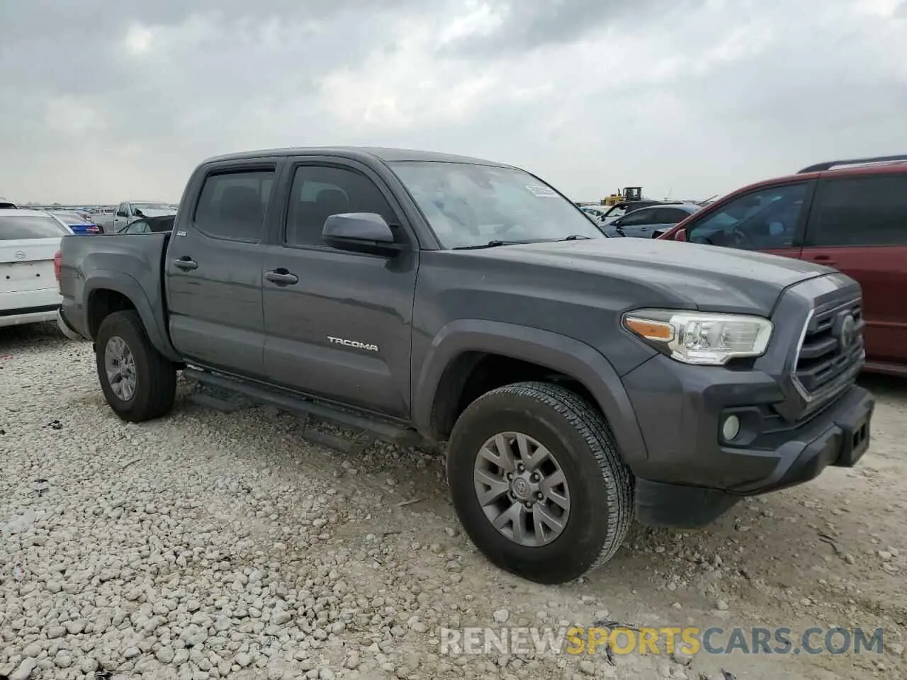 4 Photograph of a damaged car 3TMAZ5CN9KM081238 TOYOTA TACOMA 2019