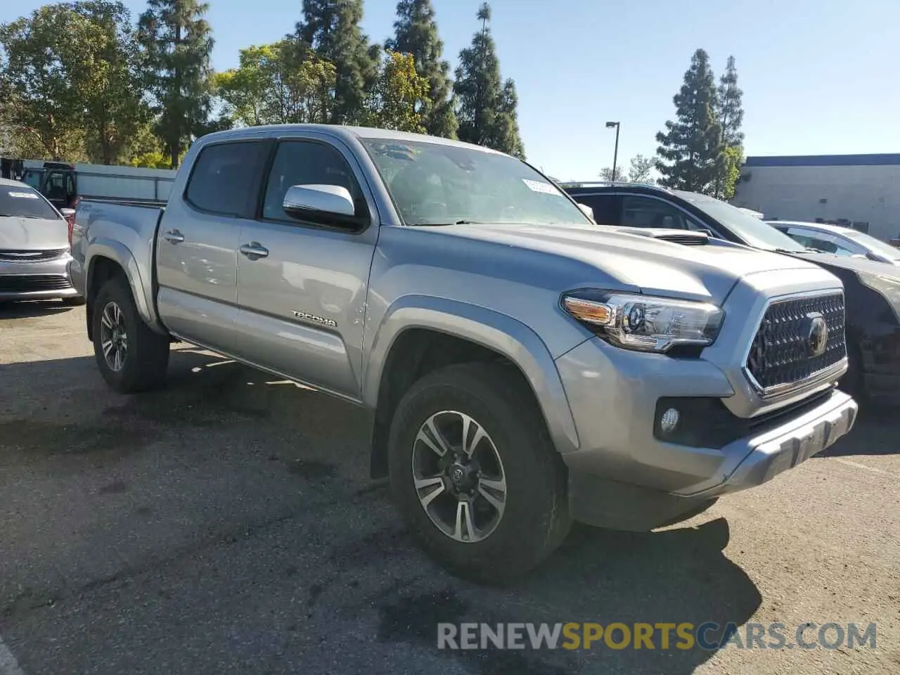 4 Photograph of a damaged car 3TMAZ5CN9KM082809 TOYOTA TACOMA 2019