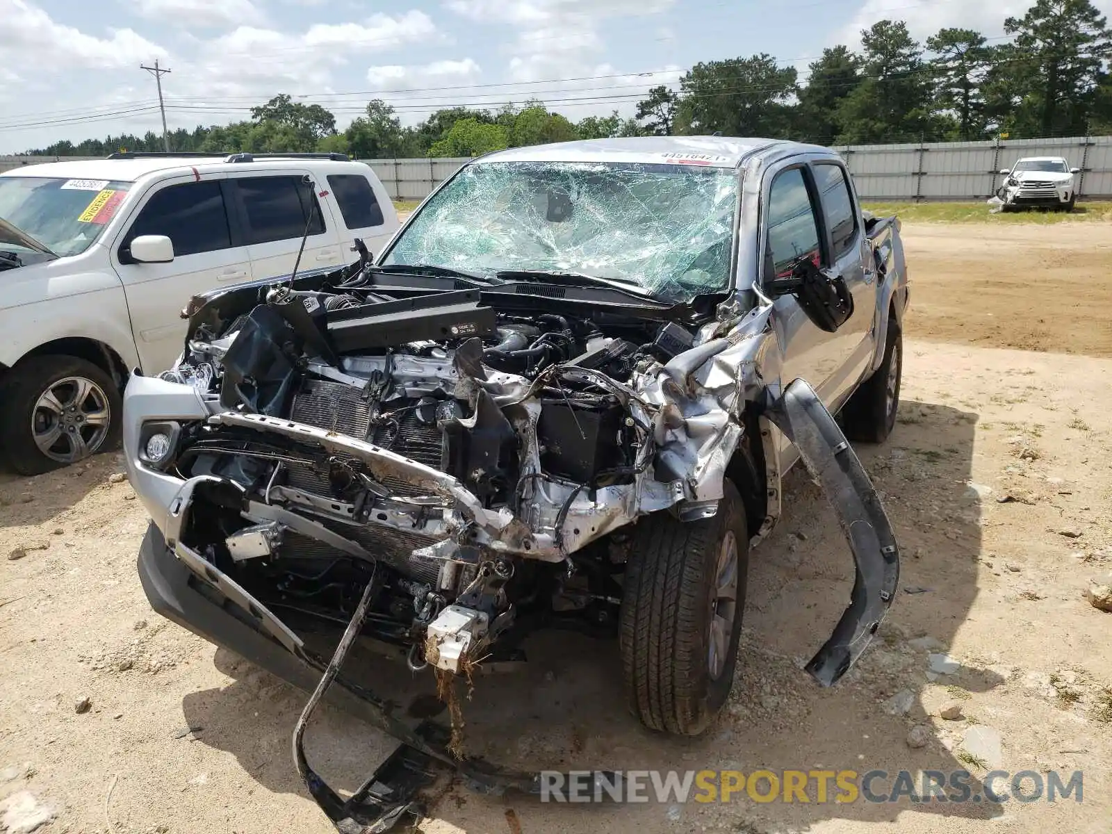 2 Photograph of a damaged car 3TMAZ5CN9KM093566 TOYOTA TACOMA 2019