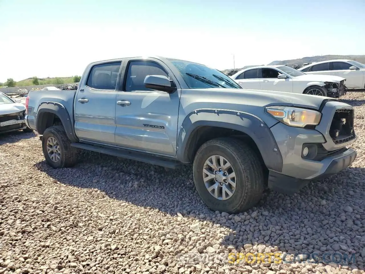 4 Photograph of a damaged car 3TMAZ5CN9KM103738 TOYOTA TACOMA 2019