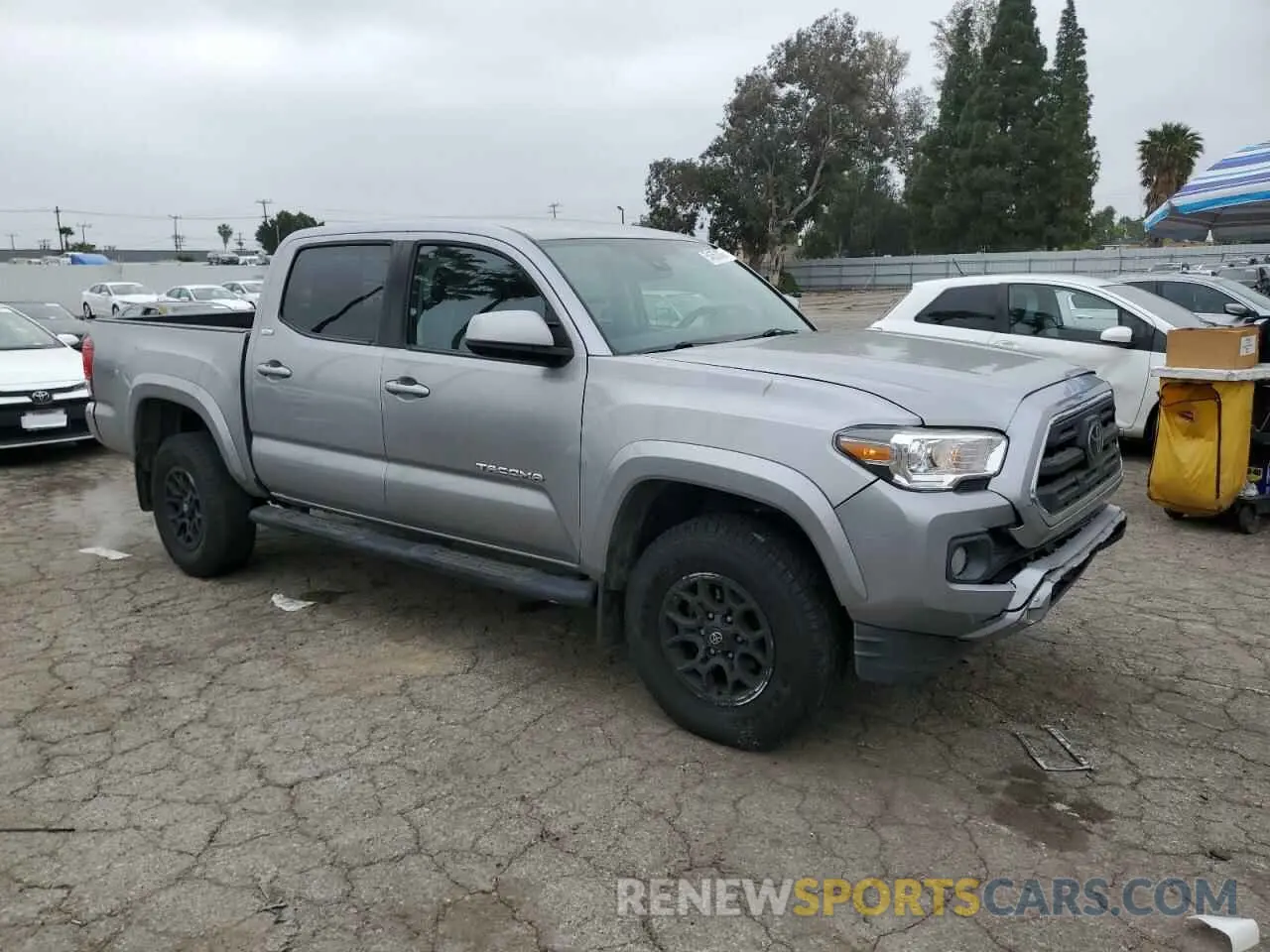 4 Photograph of a damaged car 3TMAZ5CN9KM104632 TOYOTA TACOMA 2019