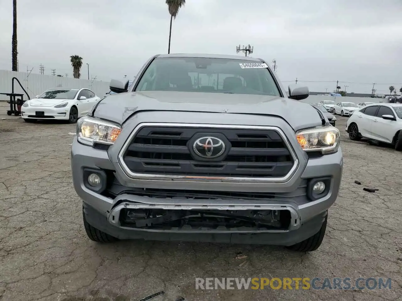 5 Photograph of a damaged car 3TMAZ5CN9KM104632 TOYOTA TACOMA 2019