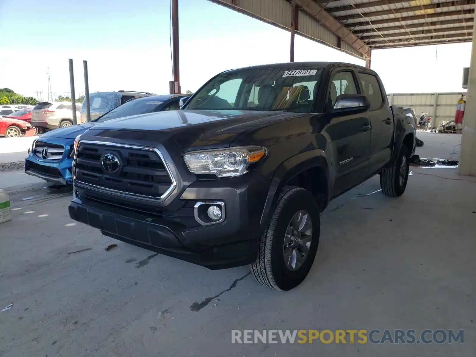 2 Photograph of a damaged car 3TMAZ5CN9KM106848 TOYOTA TACOMA 2019