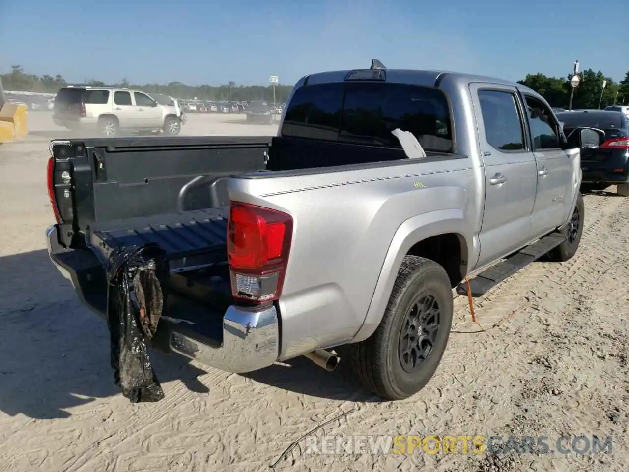 4 Photograph of a damaged car 3TMAZ5CN9KM109930 TOYOTA TACOMA 2019