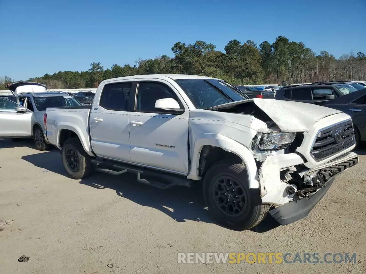 4 Photograph of a damaged car 3TMAZ5CN9KM111645 TOYOTA TACOMA 2019
