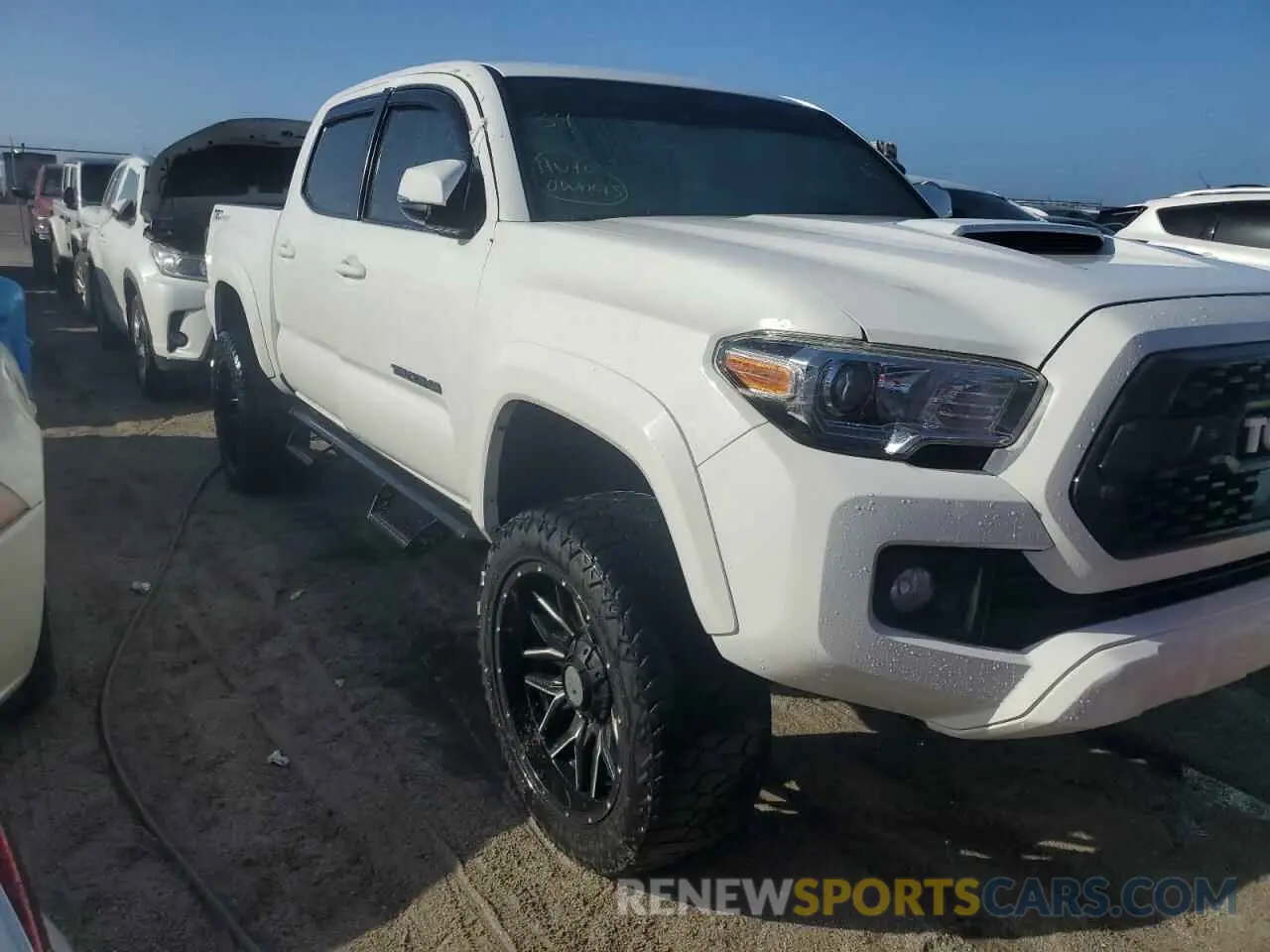 4 Photograph of a damaged car 3TMAZ5CN9KM112553 TOYOTA TACOMA 2019