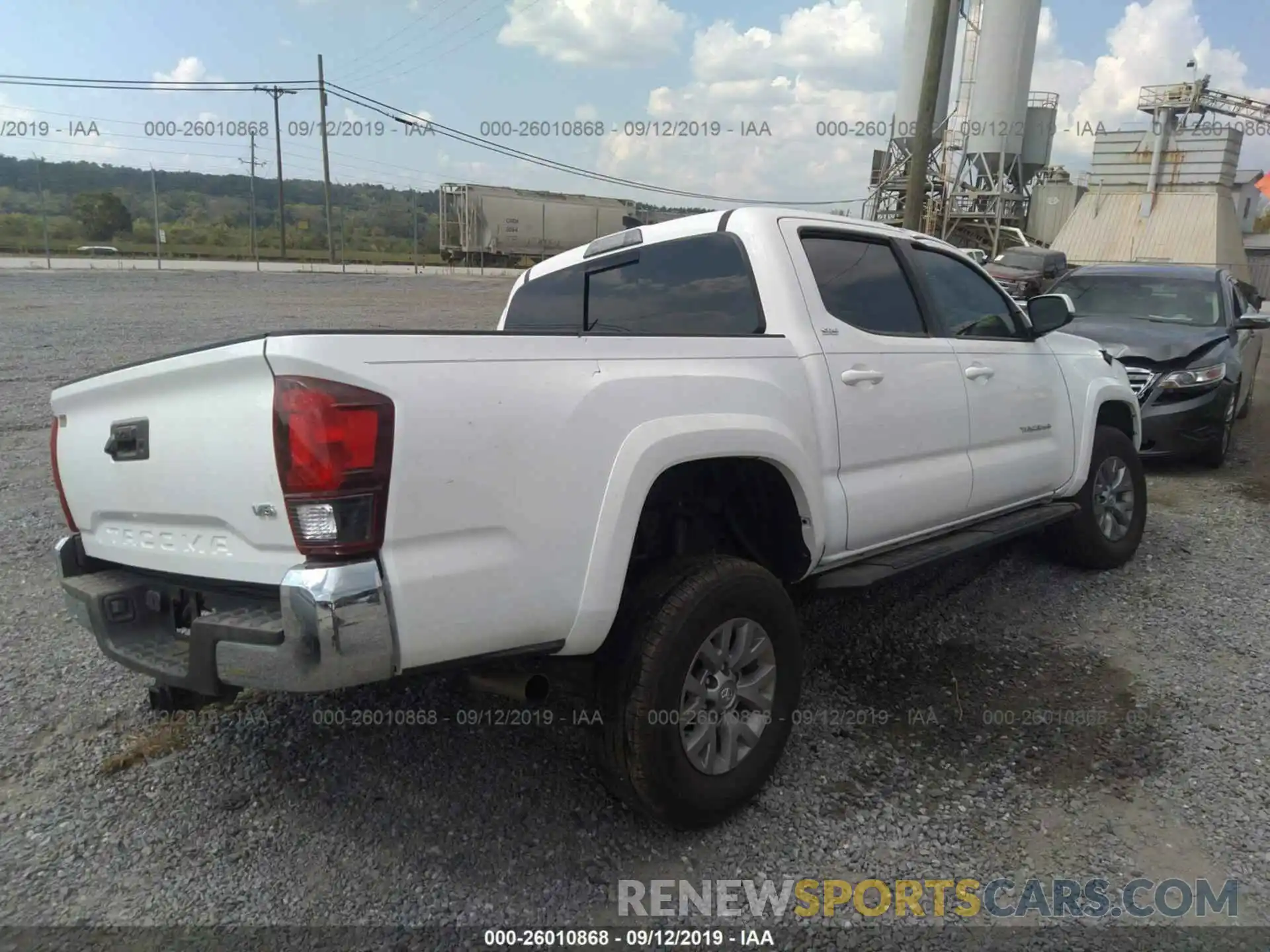 4 Photograph of a damaged car 3TMAZ5CNXKM097237 TOYOTA TACOMA 2019