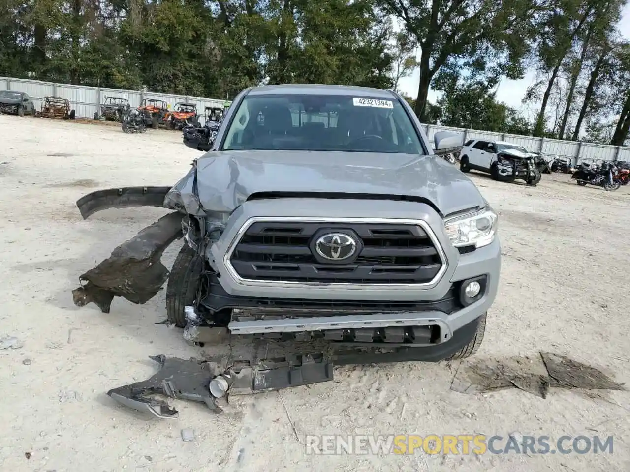 5 Photograph of a damaged car 3TMAZ5CNXKM102081 TOYOTA TACOMA 2019