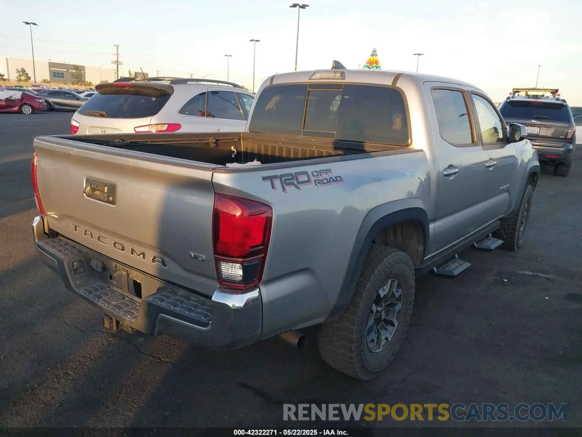 4 Photograph of a damaged car 3TMAZ5CNXKM105711 TOYOTA TACOMA 2019