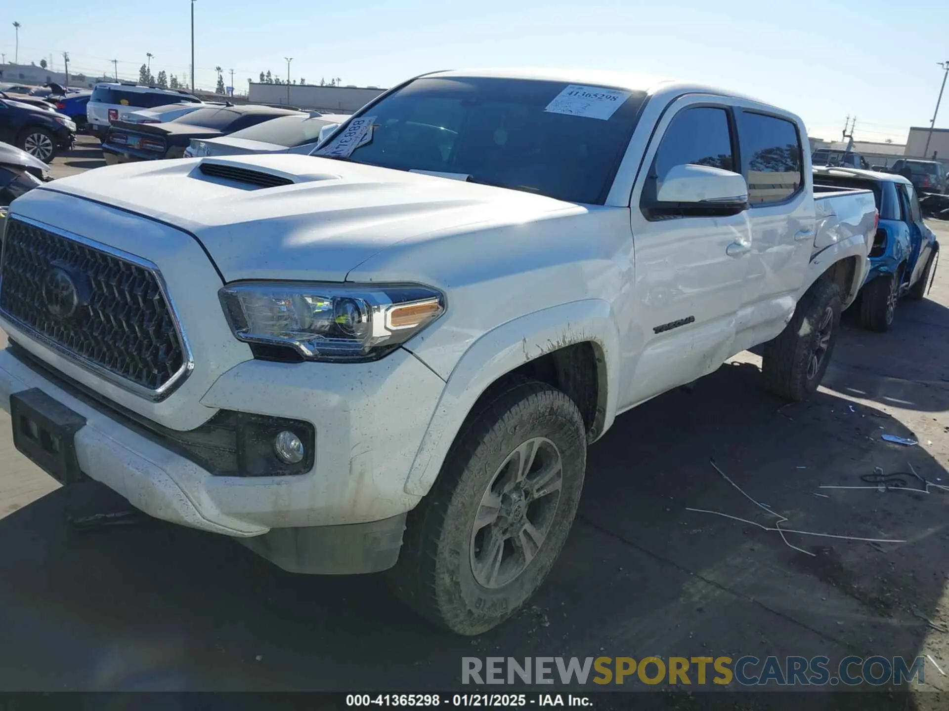 2 Photograph of a damaged car 3TMAZ5CNXKM109323 TOYOTA TACOMA 2019