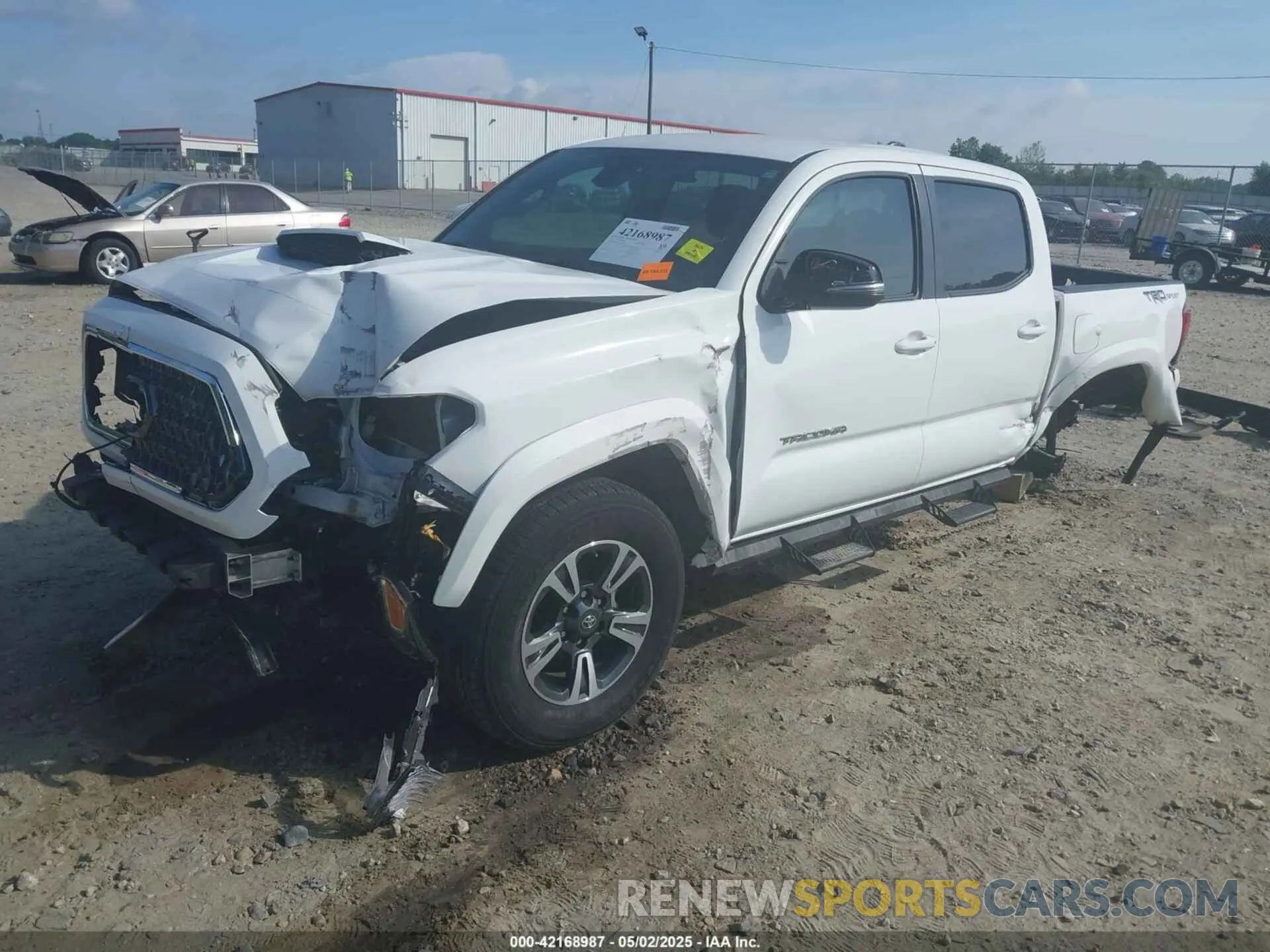2 Photograph of a damaged car 3TMAZ5CNXKM112433 TOYOTA TACOMA 2019