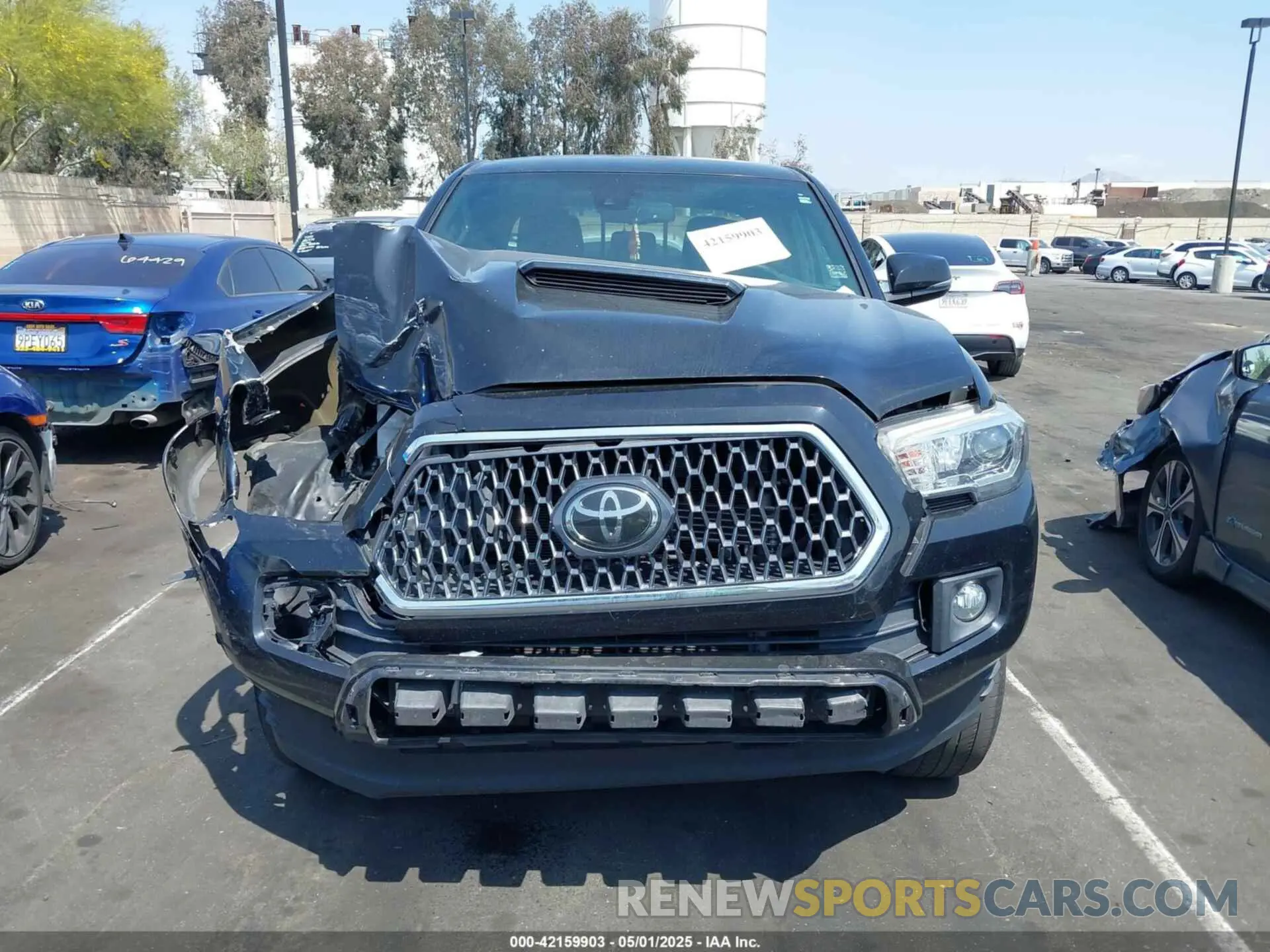 12 Photograph of a damaged car 3TMBZ5DN1KM023093 TOYOTA TACOMA 2019