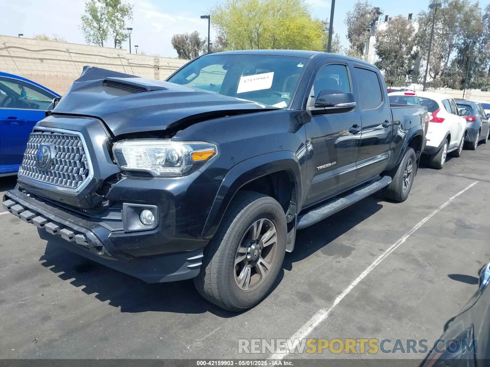 2 Photograph of a damaged car 3TMBZ5DN1KM023093 TOYOTA TACOMA 2019