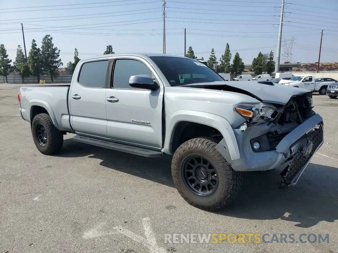 4 Photograph of a damaged car 3TMBZ5DN2KM022938 TOYOTA TACOMA 2019