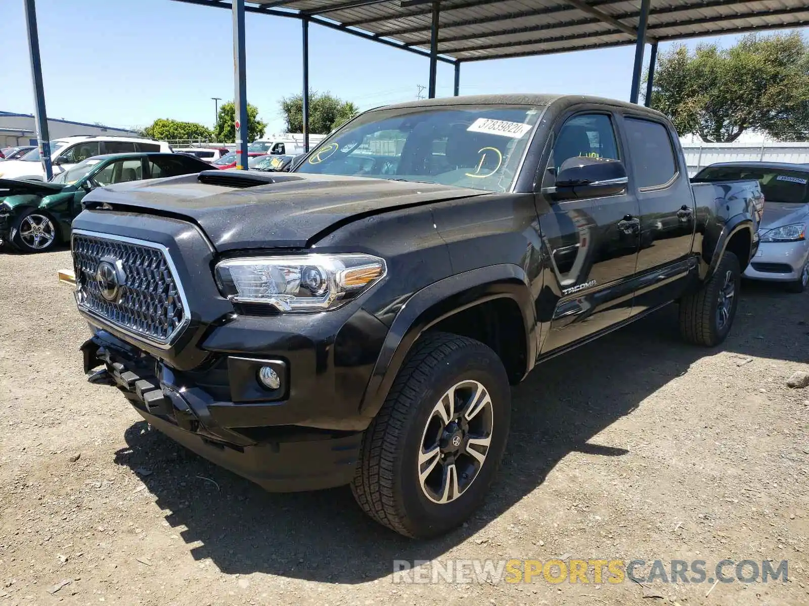 2 Photograph of a damaged car 3TMBZ5DN5KM022691 TOYOTA TACOMA 2019