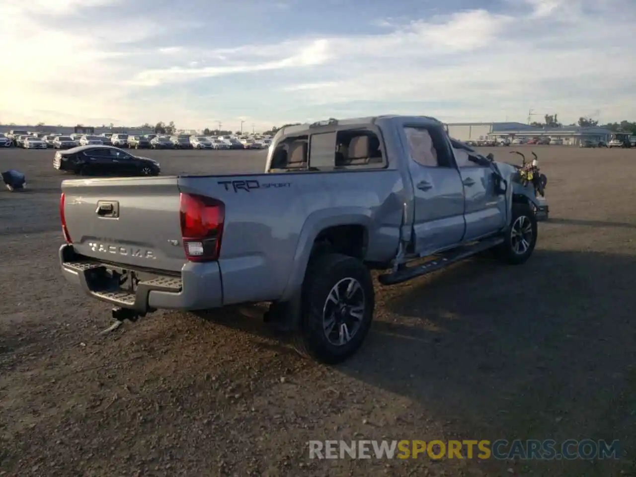 4 Photograph of a damaged car 3TMBZ5DNXKM017566 TOYOTA TACOMA 2019