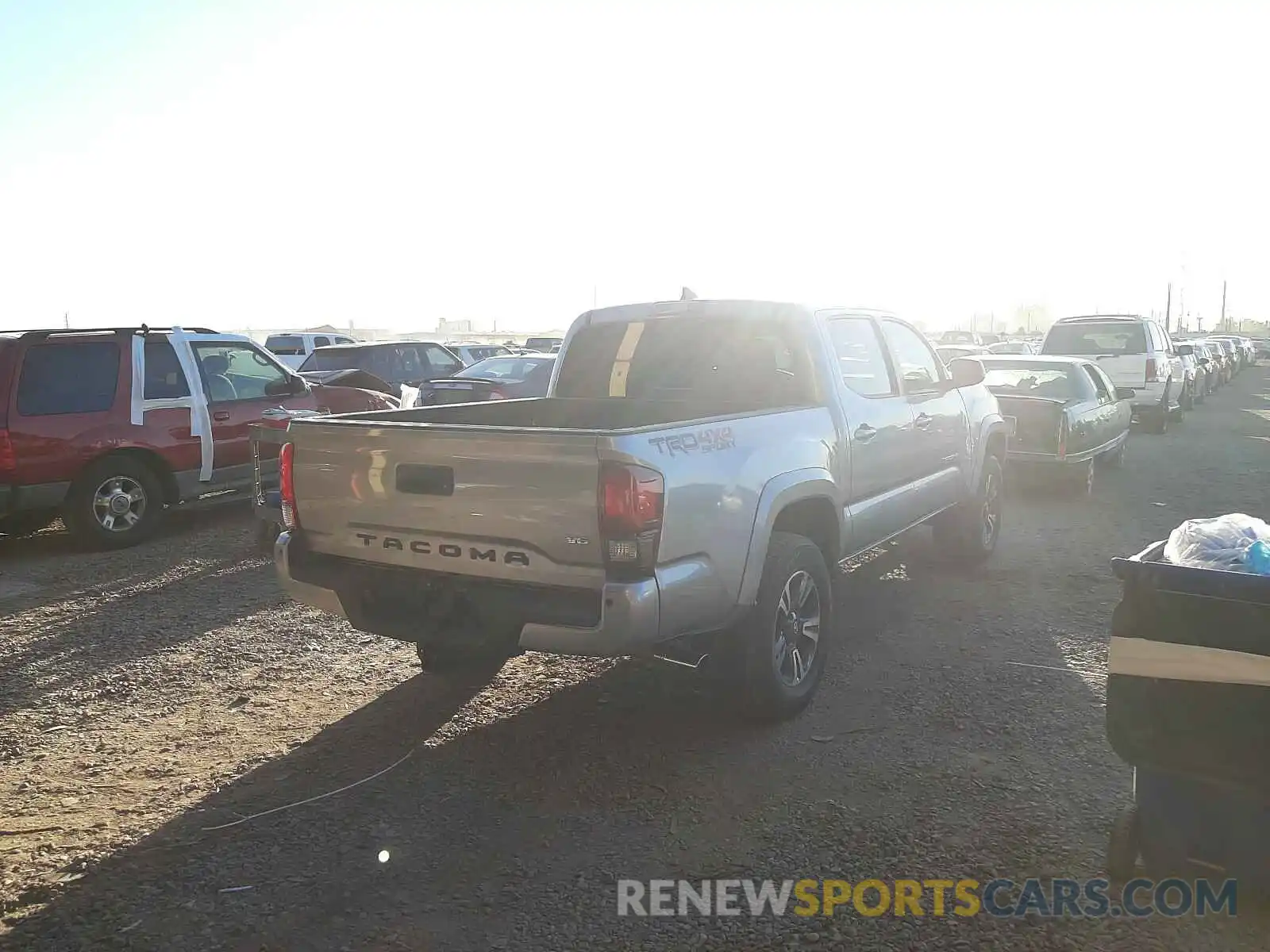 4 Photograph of a damaged car 3TMCZ5AN0KM214268 TOYOTA TACOMA 2019