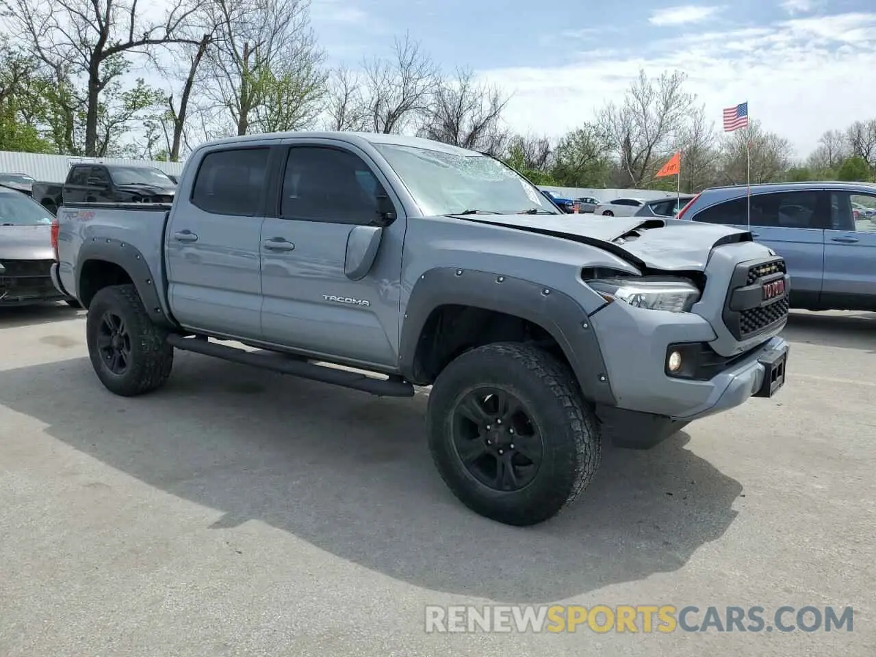 4 Photograph of a damaged car 3TMCZ5AN0KM224296 TOYOTA TACOMA 2019