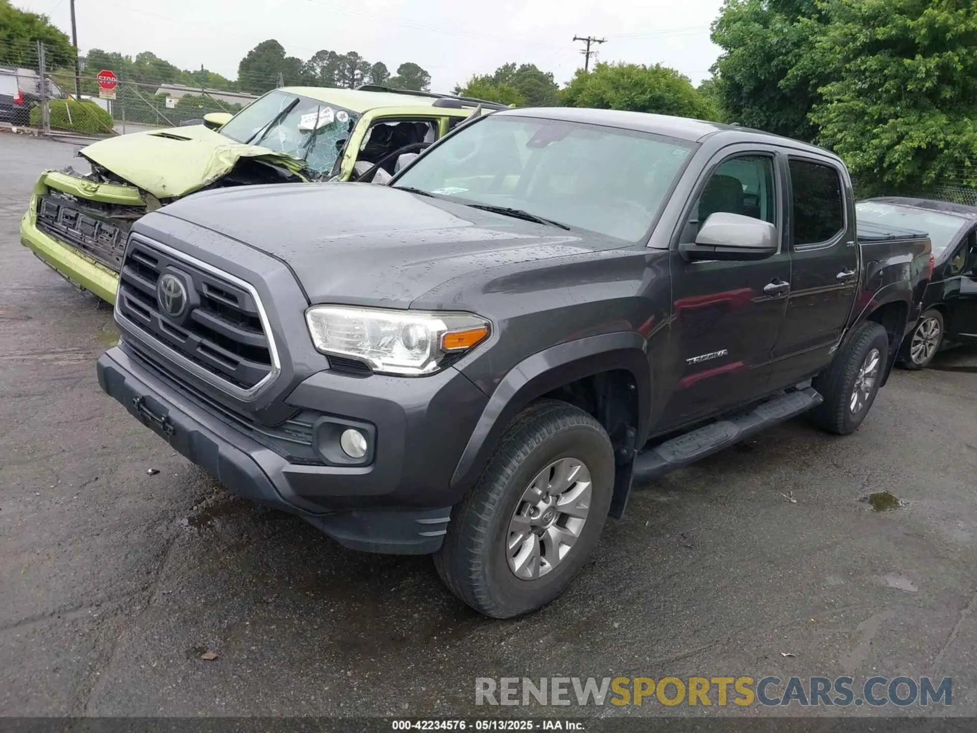 2 Photograph of a damaged car 3TMCZ5AN0KM242359 TOYOTA TACOMA 2019