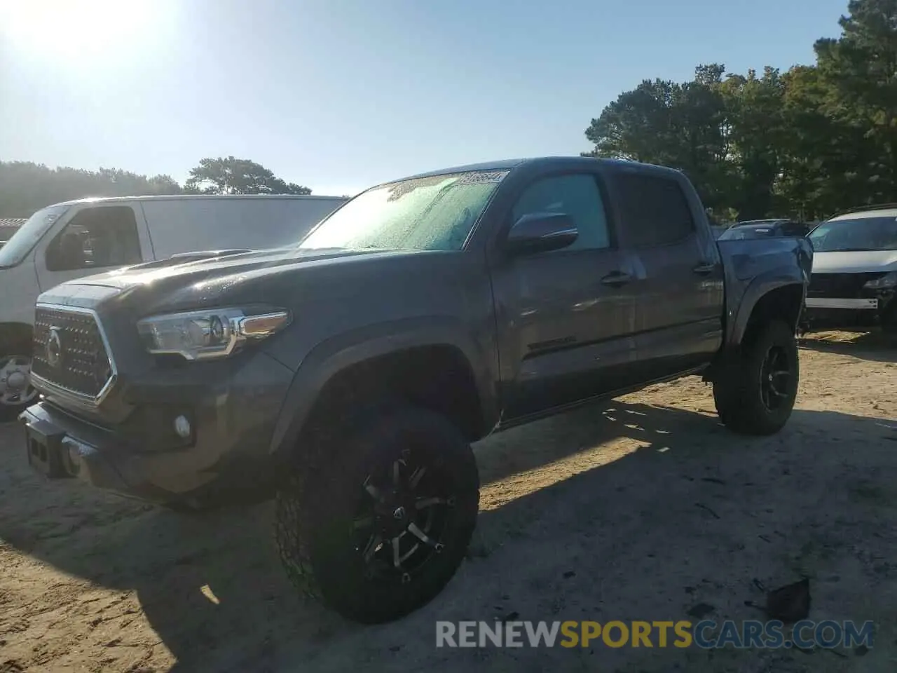 1 Photograph of a damaged car 3TMCZ5AN0KM246038 TOYOTA TACOMA 2019