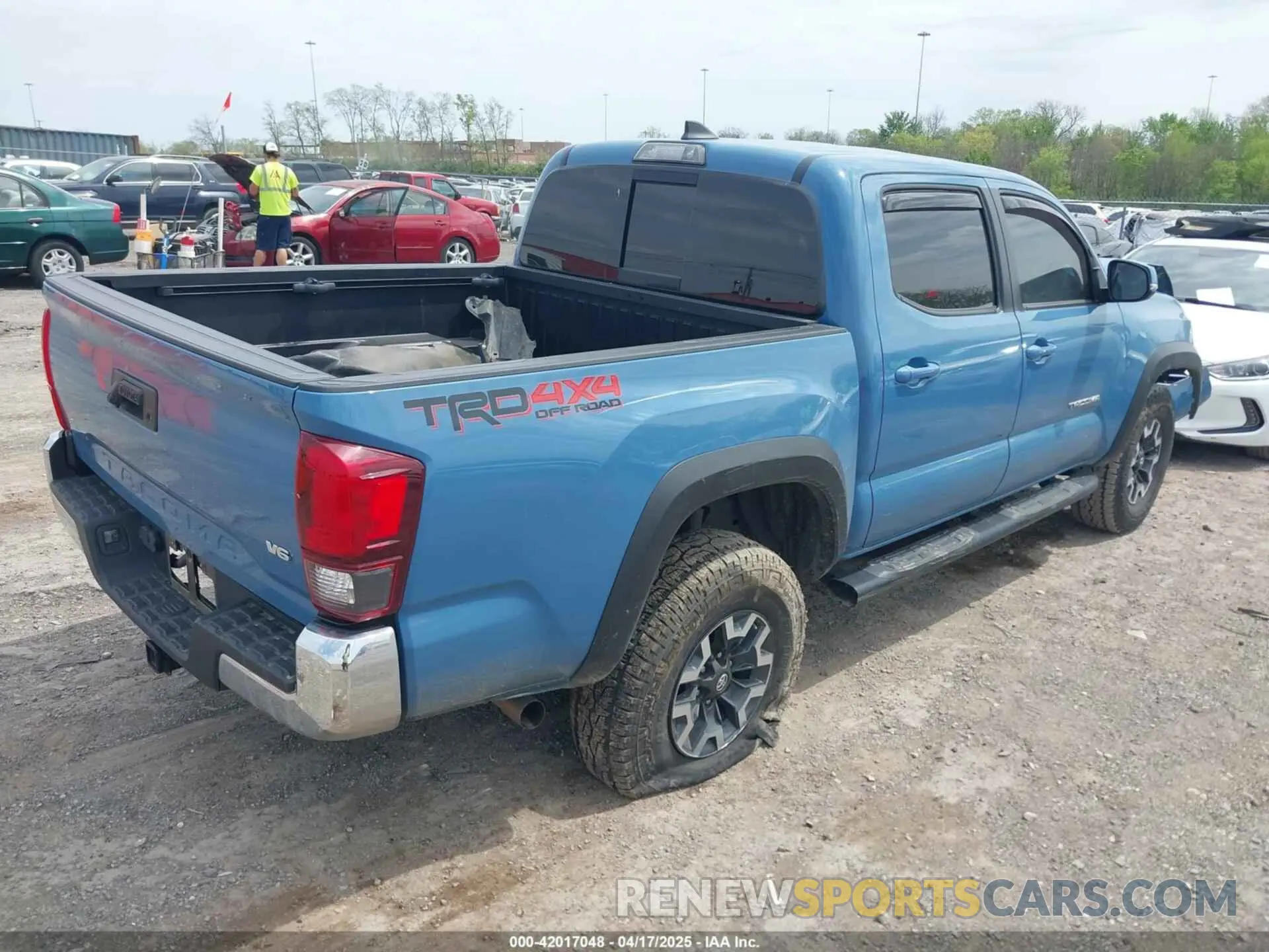 4 Photograph of a damaged car 3TMCZ5AN0KM260201 TOYOTA TACOMA 2019
