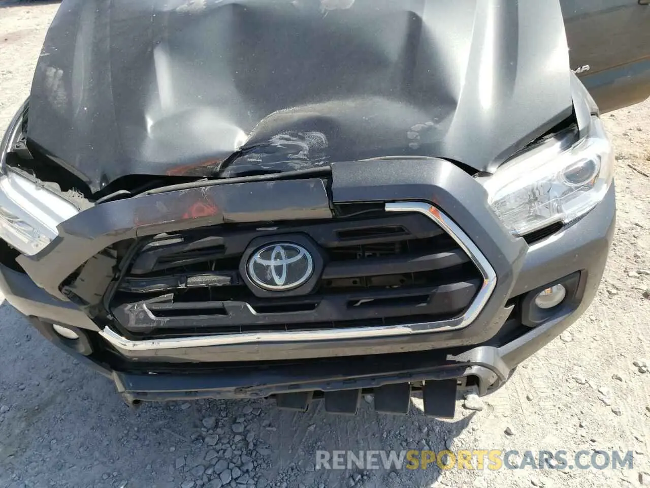 11 Photograph of a damaged car 3TMCZ5AN0KM261073 TOYOTA TACOMA 2019