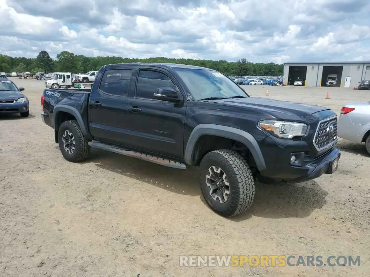 4 Photograph of a damaged car 3TMCZ5AN0KM265933 TOYOTA TACOMA 2019