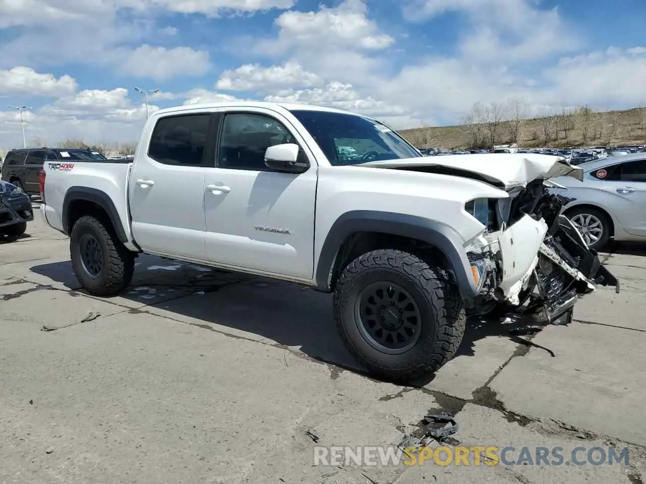 4 Photograph of a damaged car 3TMCZ5AN0KM275894 TOYOTA TACOMA 2019