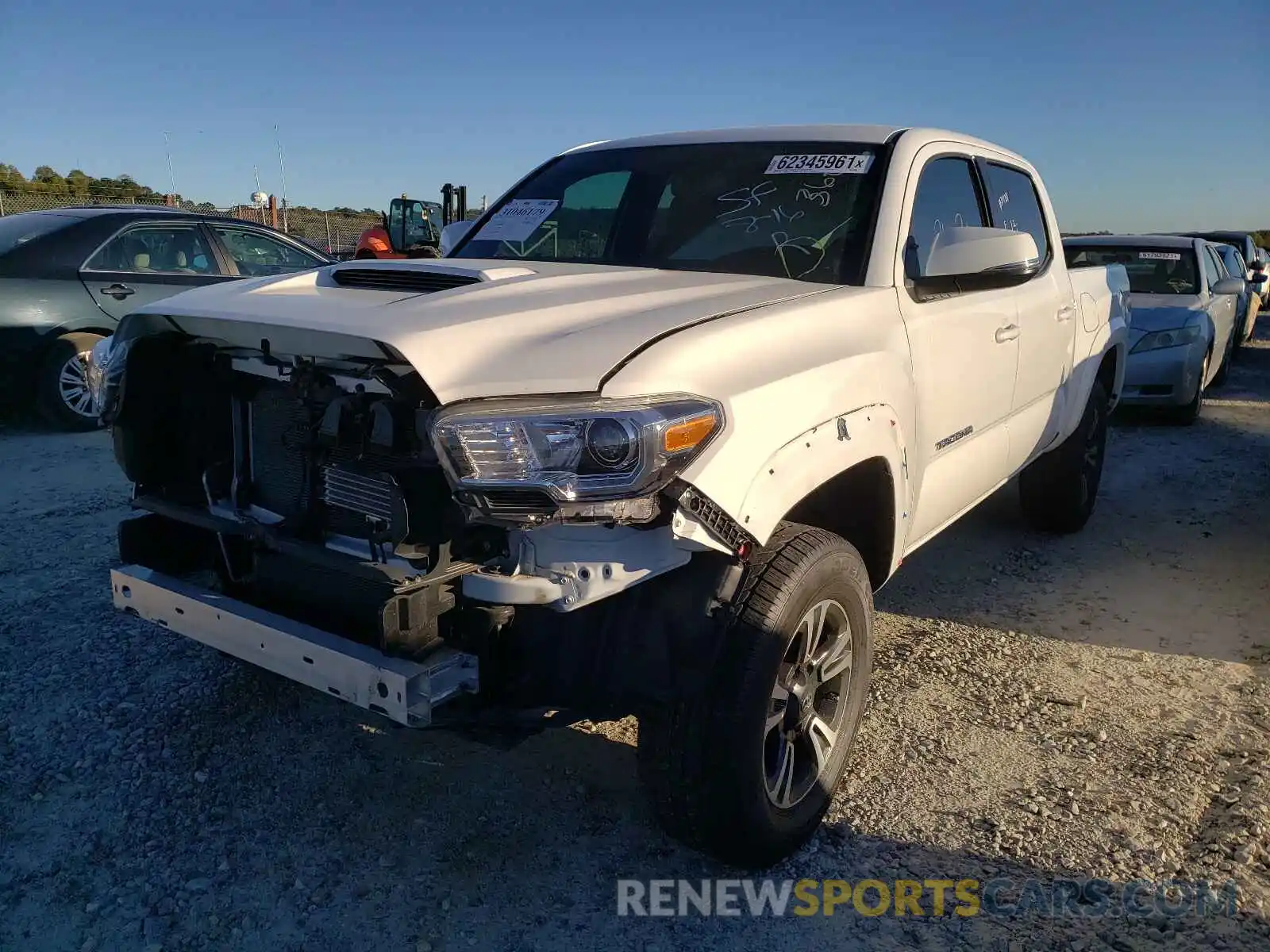 2 Photograph of a damaged car 3TMCZ5AN0KM286085 TOYOTA TACOMA 2019