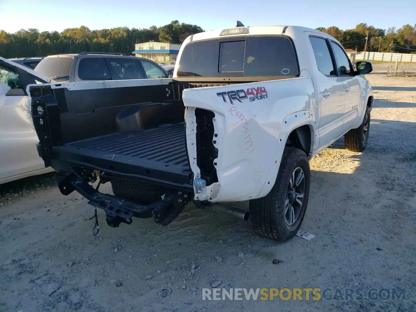 4 Photograph of a damaged car 3TMCZ5AN0KM286085 TOYOTA TACOMA 2019