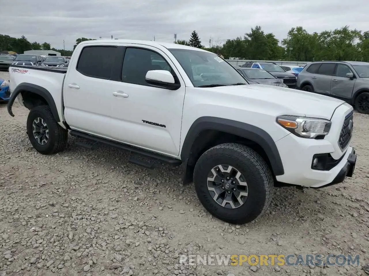 4 Photograph of a damaged car 3TMCZ5AN1KM190613 TOYOTA TACOMA 2019