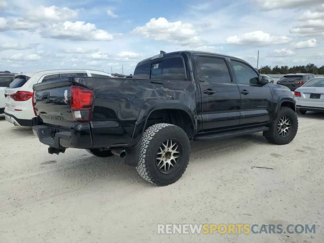 3 Photograph of a damaged car 3TMCZ5AN1KM208785 TOYOTA TACOMA 2019
