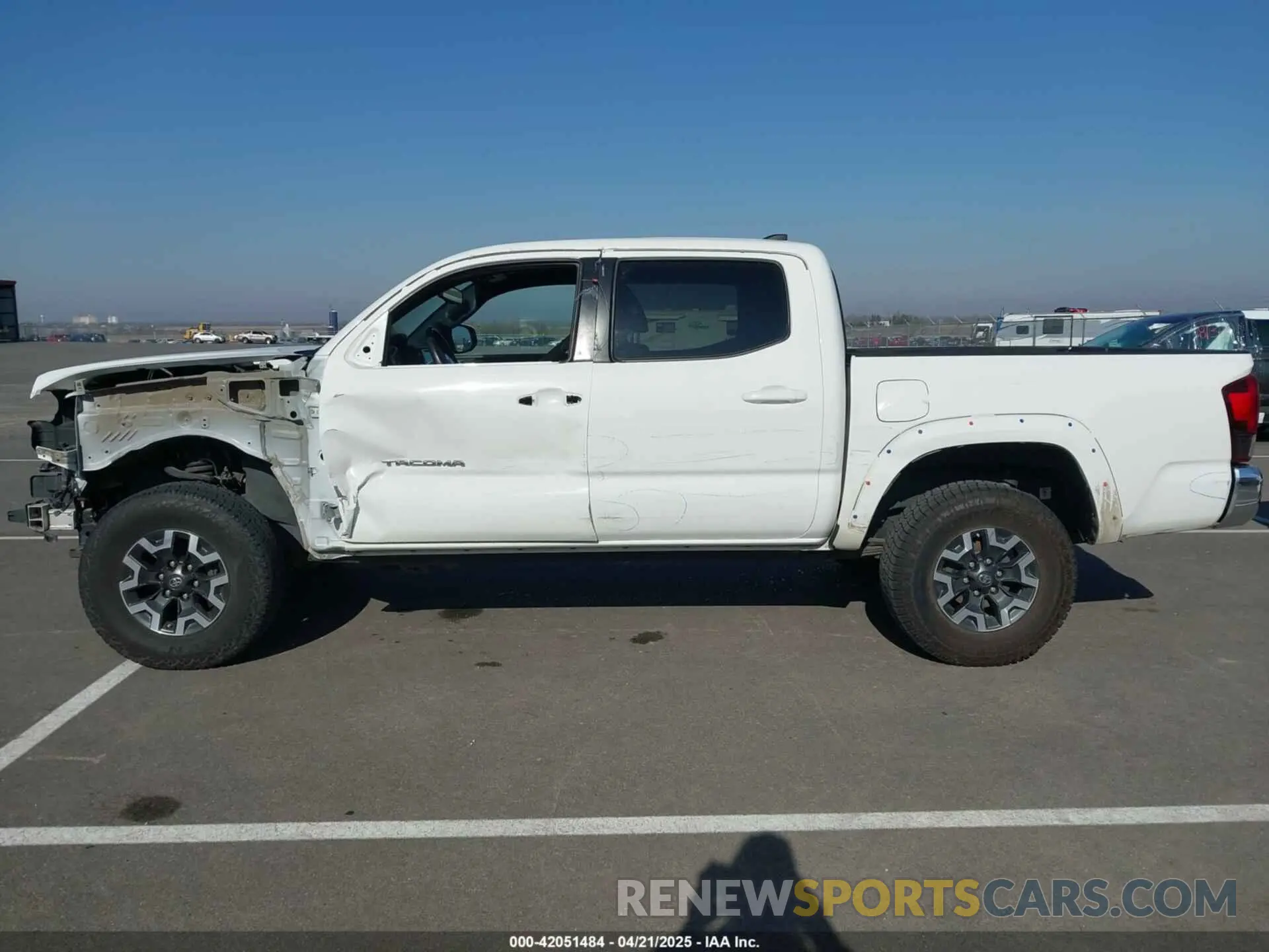 14 Photograph of a damaged car 3TMCZ5AN1KM210911 TOYOTA TACOMA 2019