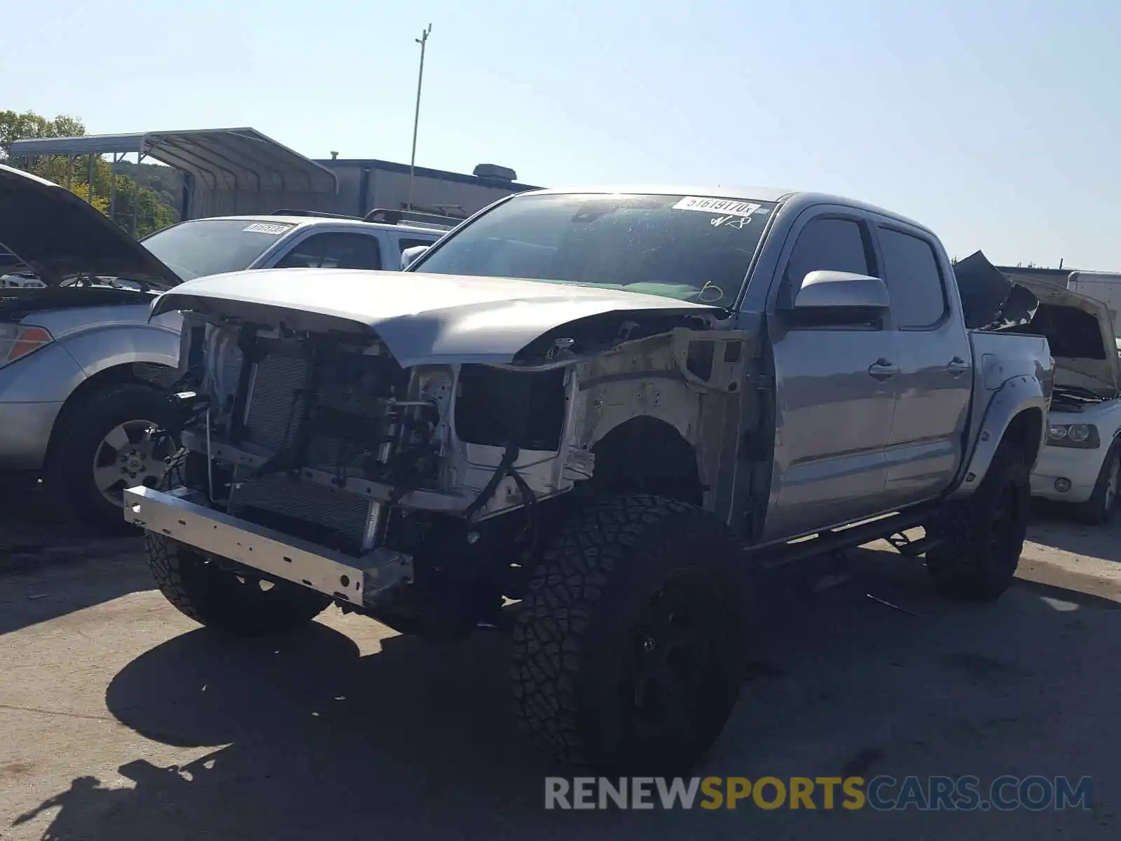 2 Photograph of a damaged car 3TMCZ5AN1KM235758 TOYOTA TACOMA 2019