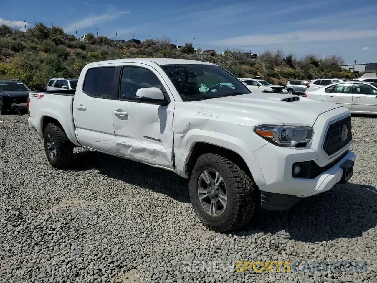 4 Photograph of a damaged car 3TMCZ5AN1KM263494 TOYOTA TACOMA 2019