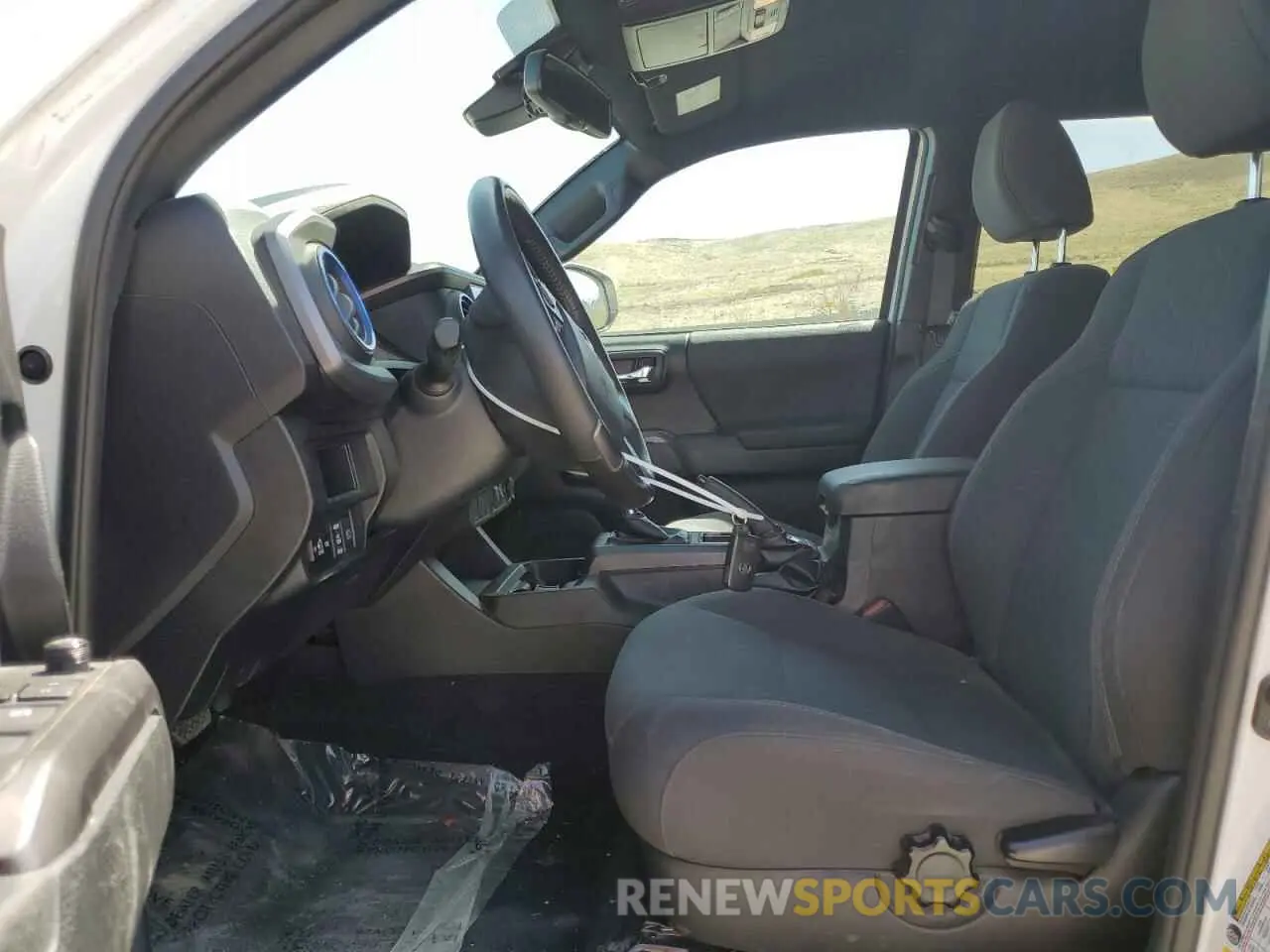 7 Photograph of a damaged car 3TMCZ5AN1KM263494 TOYOTA TACOMA 2019