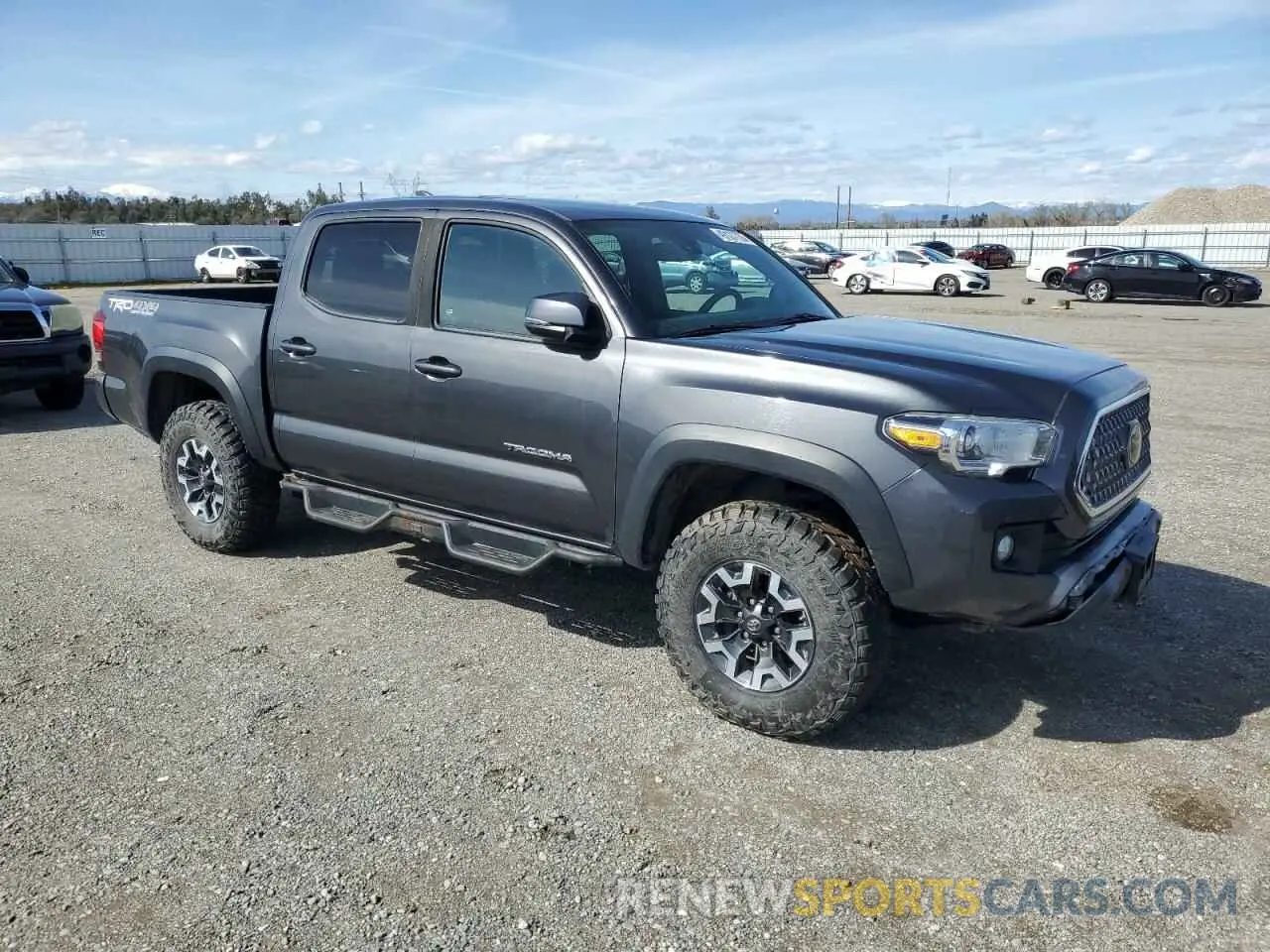 4 Photograph of a damaged car 3TMCZ5AN1KM266315 TOYOTA TACOMA 2019