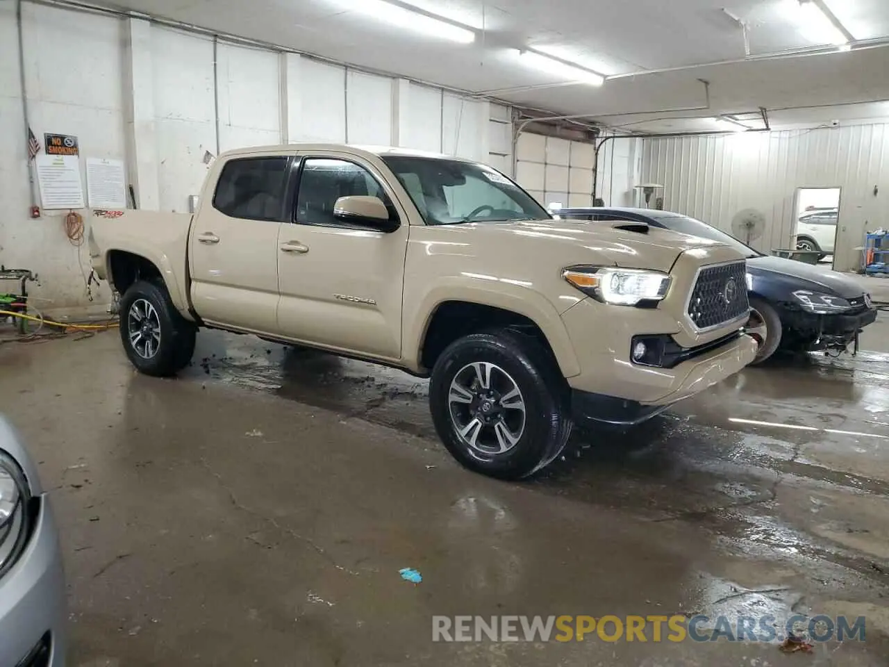 4 Photograph of a damaged car 3TMCZ5AN1KM285074 TOYOTA TACOMA 2019