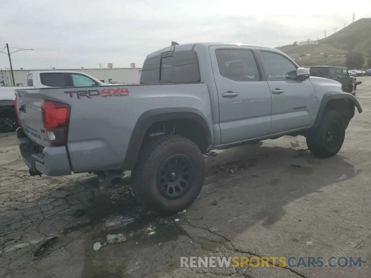 3 Photograph of a damaged car 3TMCZ5AN2KM192032 TOYOTA TACOMA 2019