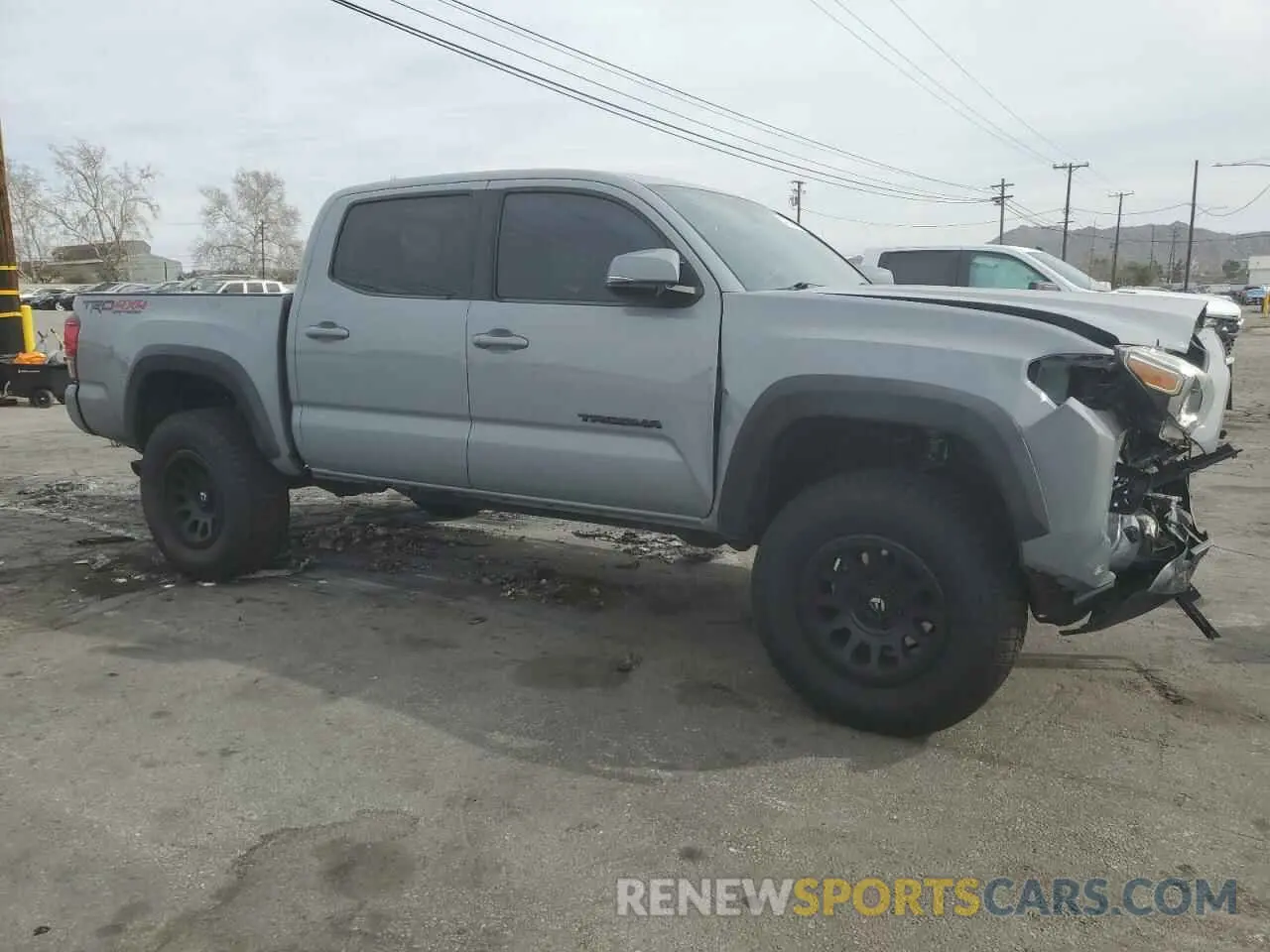 4 Photograph of a damaged car 3TMCZ5AN2KM192032 TOYOTA TACOMA 2019