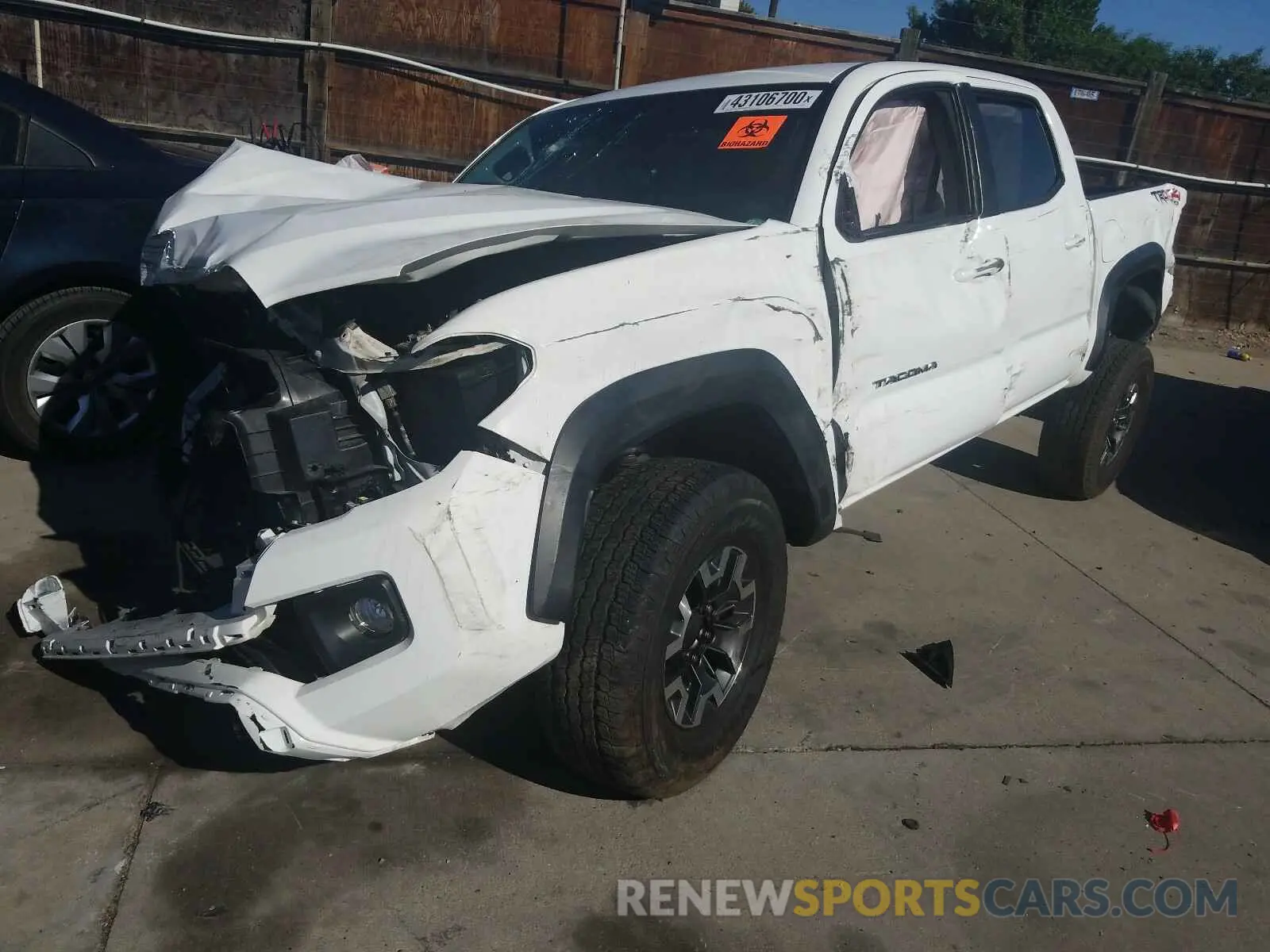 2 Photograph of a damaged car 3TMCZ5AN2KM204504 TOYOTA TACOMA 2019