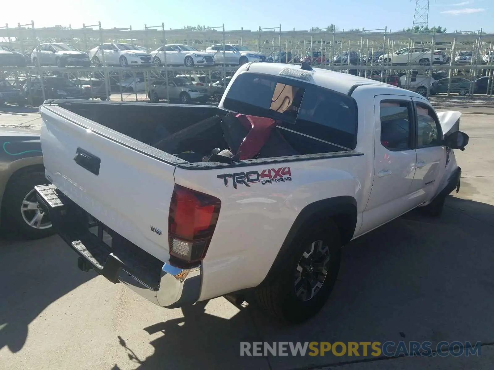 4 Photograph of a damaged car 3TMCZ5AN2KM204504 TOYOTA TACOMA 2019