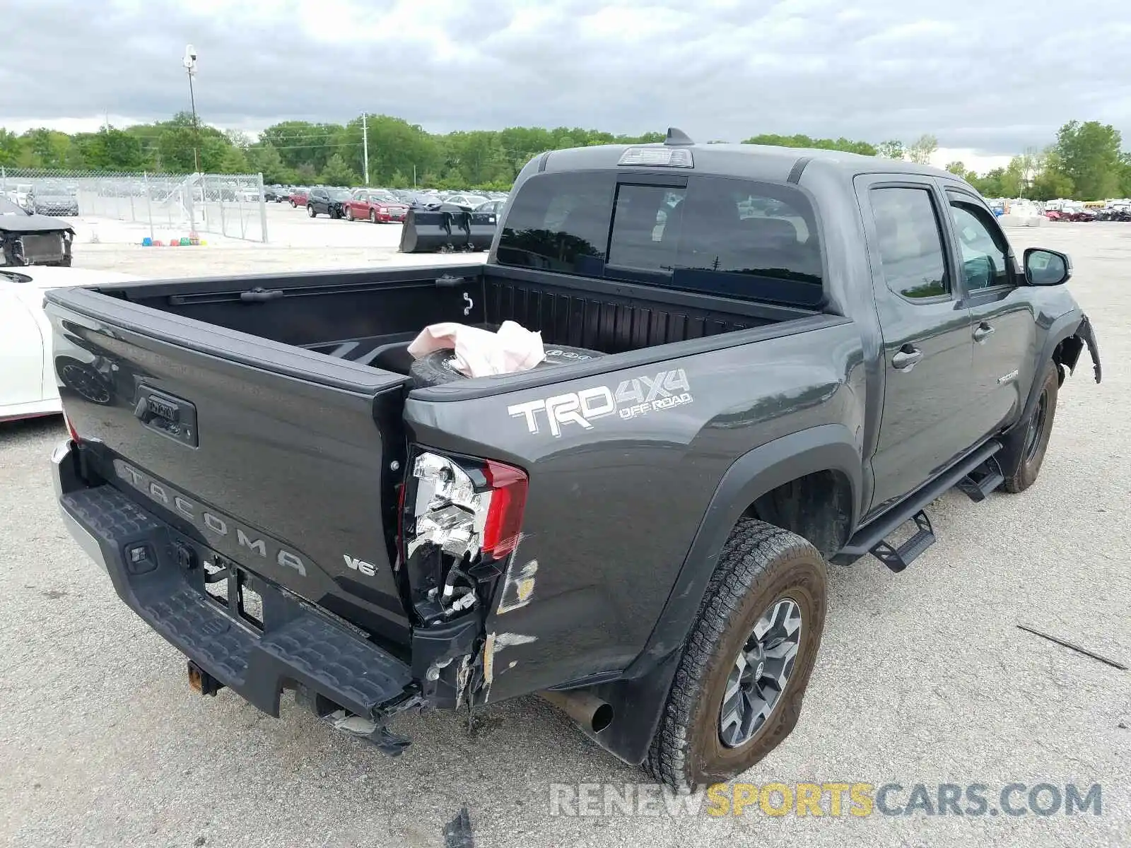 4 Photograph of a damaged car 3TMCZ5AN2KM210495 TOYOTA TACOMA 2019