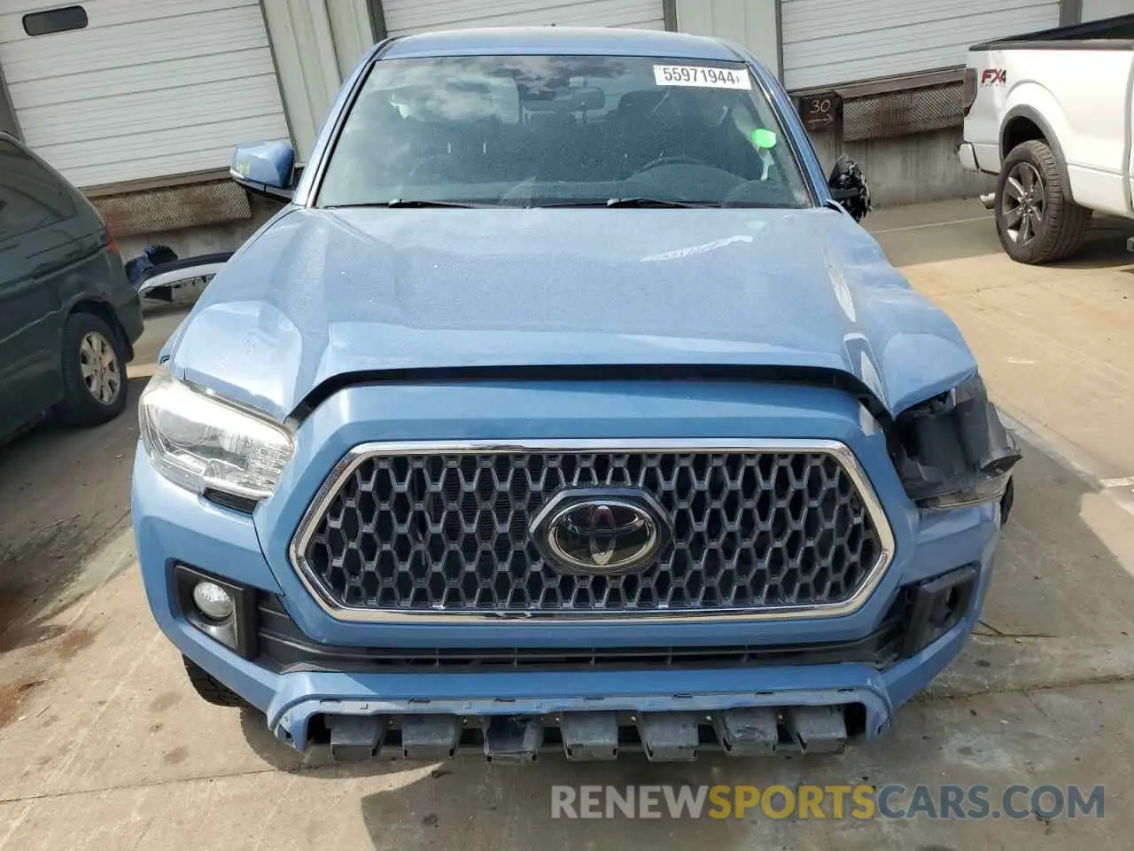 5 Photograph of a damaged car 3TMCZ5AN2KM225823 TOYOTA TACOMA 2019