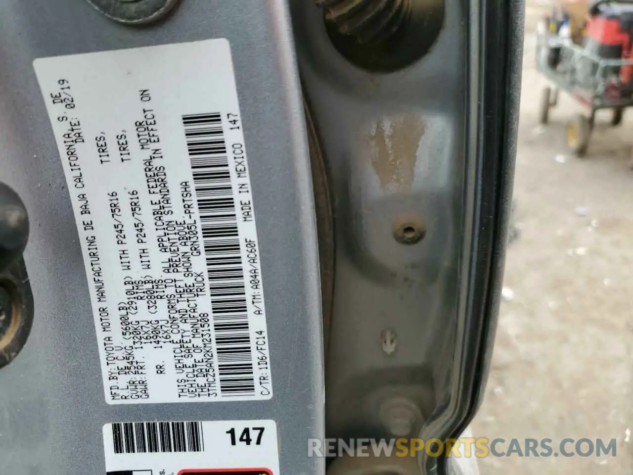 12 Photograph of a damaged car 3TMCZ5AN2KM231508 TOYOTA TACOMA 2019