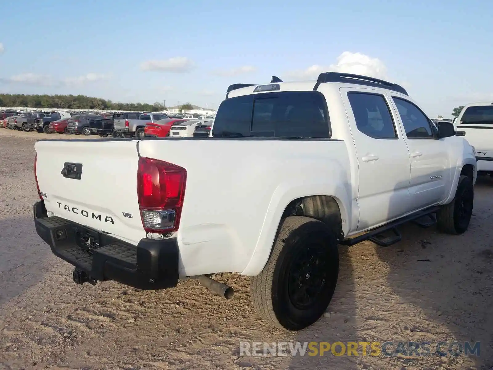 4 Photograph of a damaged car 3TMCZ5AN2KM247434 TOYOTA TACOMA 2019