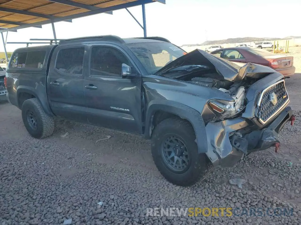 4 Photograph of a damaged car 3TMCZ5AN2KM255453 TOYOTA TACOMA 2019