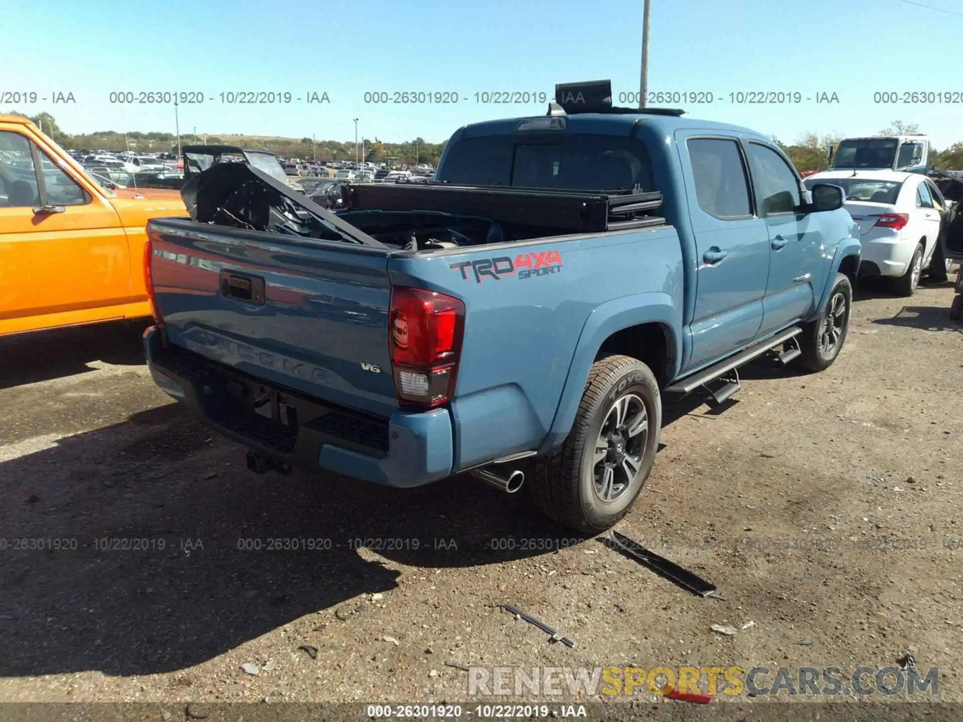 4 Photograph of a damaged car 3TMCZ5AN2KM273208 TOYOTA TACOMA 2019