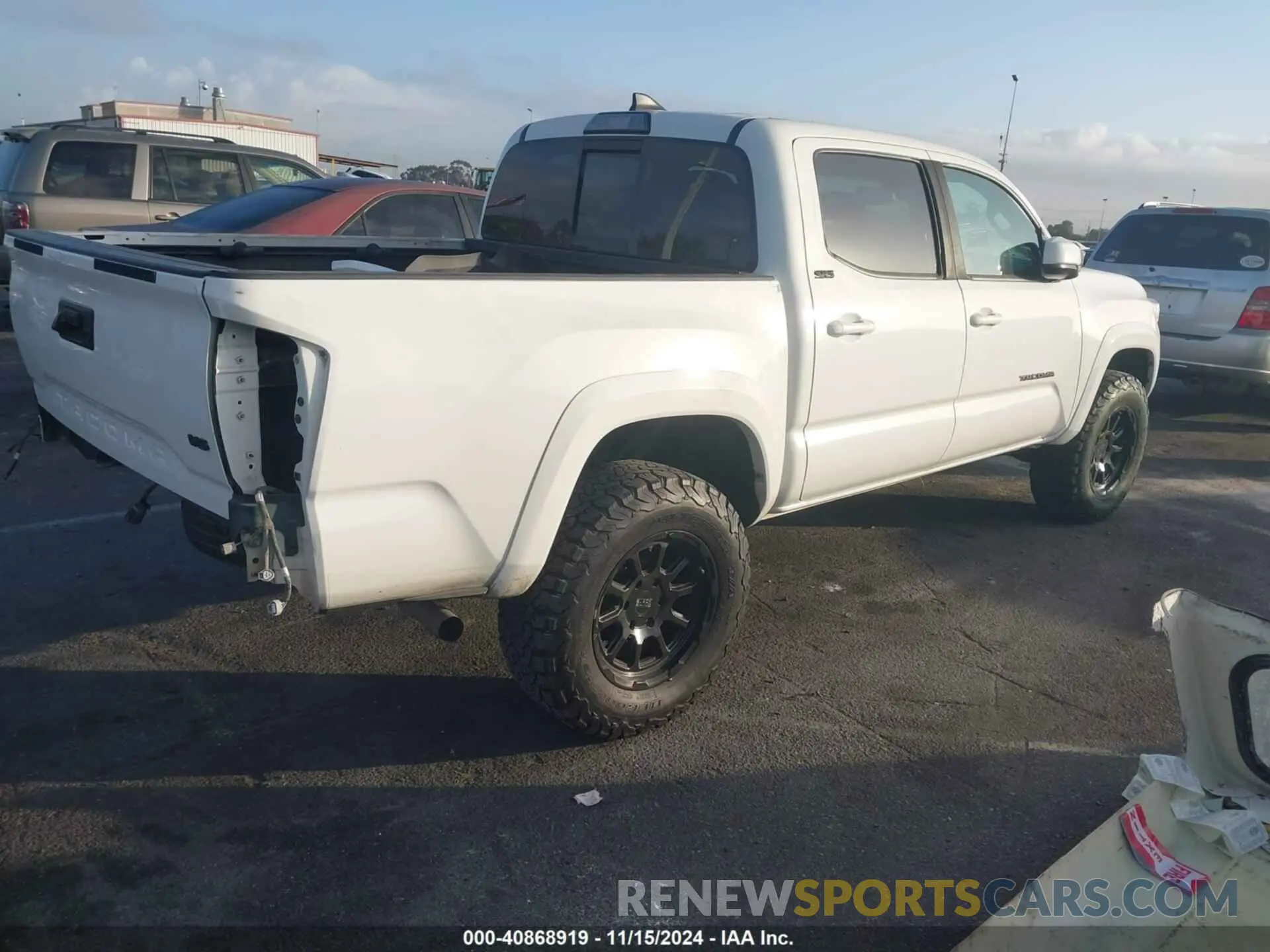 4 Photograph of a damaged car 3TMCZ5AN3KM198213 TOYOTA TACOMA 2019