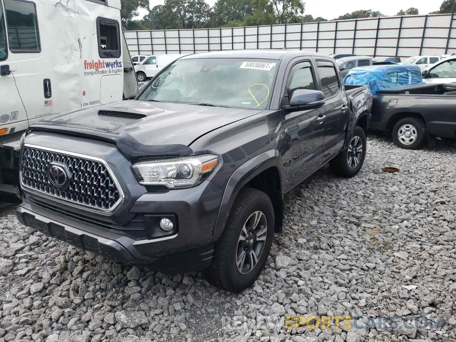 2 Photograph of a damaged car 3TMCZ5AN3KM214247 TOYOTA TACOMA 2019